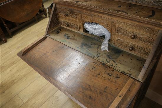 An Anglo Indian foliate carved camphorwood bureau, c.1900, W.92cm